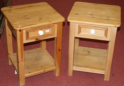 Lot 1469 - A pair of modern pine round cornered two-tier...