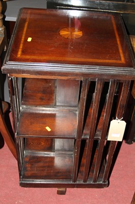 Lot 1479 - A mahogany and inlaid square revolving...
