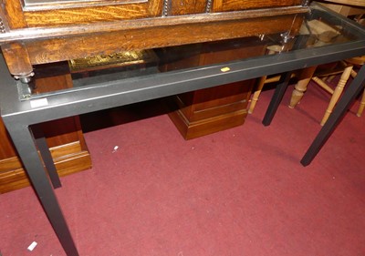 Lot 1484 - A contemporary anodised metal and glass topped...