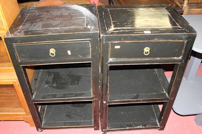 Lot 1489 - A pair of contemporary Oriental black painted...