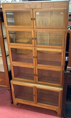 Lot 1490 - An Art Deco oak five-tier bookcase, the...
