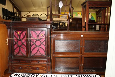 Lot 1495 - A 1930s mahogany two-tier sectional stacking...