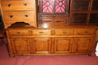 Lot 1499 - A contemporary joined oak long dresser base,...
