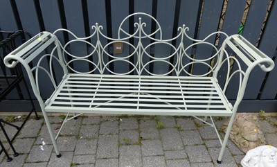 Lot 1195 - A contemporary pale green painted wrought iron...