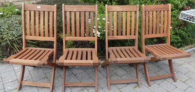 Lot 1198 - A set of four contemporary teak slatted...