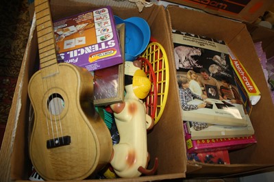 Lot 1653 - Two boxes containing a quantity of toys &...