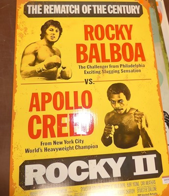Lot 1055 - A printed tin advertising sign for Rocky II,...