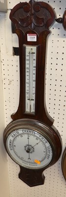 Lot 1169 - A 1930s aneroid two-dial wheel barometer