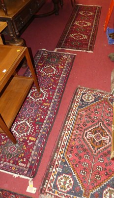 Lot 1177 - A pair of Turkish woollen red ground hall...