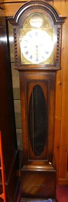 Lot 1198 - A 1920s oak Tempus Fugit longcase clock,...