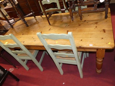 Lot 1217 - A pine round cornered farmhouse kitchen table,...