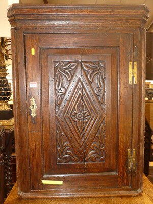 Lot 1218 - An early 19th century provincial relief carved...