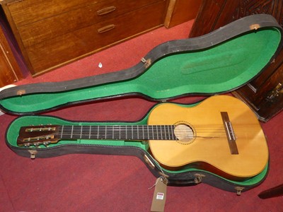 Lot 1221 - An acoustic guitar, in case