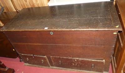 Lot 1227 - An 18th century oak hinged top mule chest,...