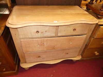 Lot 1232 - A Victorian pine serpentine front chest of two...