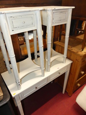 Lot 1245 - A pair of French style grey painted two-tier...