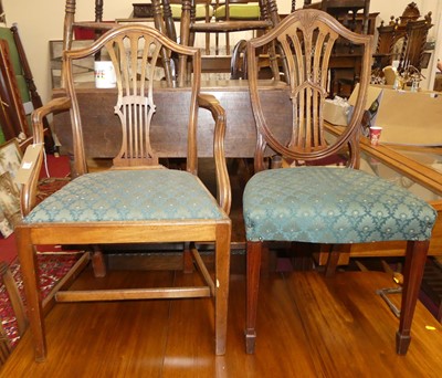 Lot 1268 - A set of four Hepplewhite style mahogany...