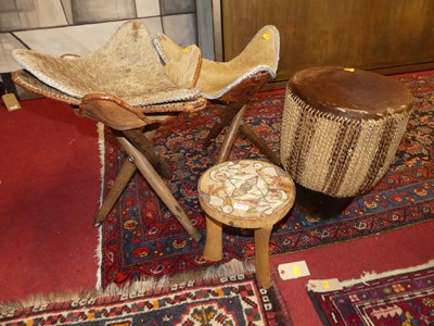Lot 1274 - A pair of African milking stools, together...