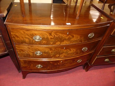 Lot 1300 - A Regency mahogany and crossbanded bowfront...