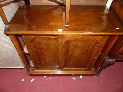 Lot 1317 - A mid-Victorian mahogany round cornered low...