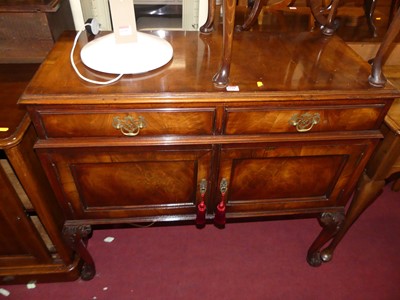 Lot 1320 - A 1930s figured walnut and crossbanded low...