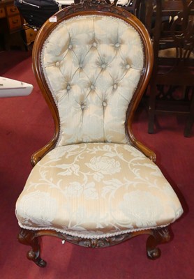 Lot 1327 - A mid-Victorian figured walnut spoonback...