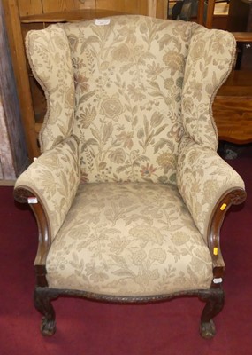 Lot 1335 - A late 19th century mahogany framed wingback...