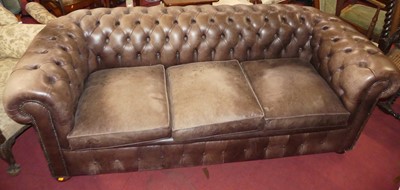 Lot 1337 - A contemporary faded chocolate brown leather...