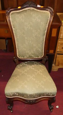 Lot 1339 - A mid-Victorian carved rosewood framed nursing...