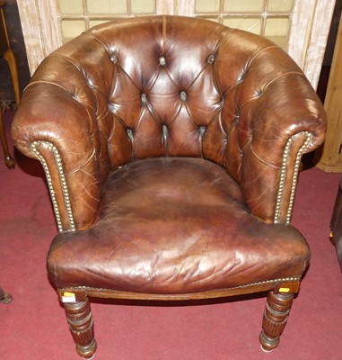 Lot 1344 - An Edwardian walnut framed and tan leather...