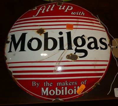 Lot 1371 - A circular enamel on metal convex sign for...