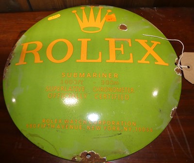 Lot 1372 - A circular convex enamel on metal sign for...