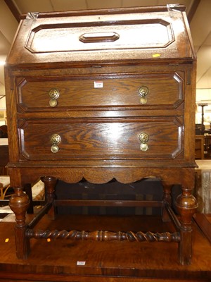 Lot 1385 - An early 20th century geometric moulded oak...