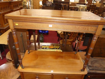 Lot 1390 - A late Victorian walnut fold-over card table,...