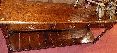 Lot 1397 - A contemporary joined oak long dresser base,...