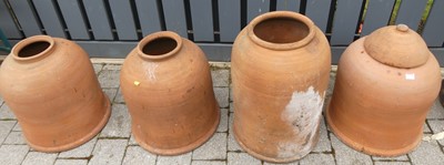 Lot 1414 - A collection of four various terracotta cloche,...