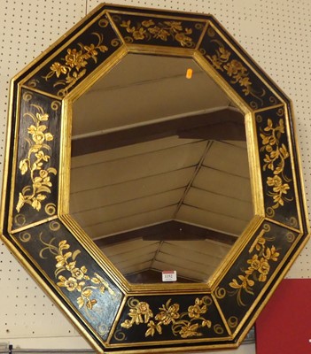 Lot 1152 - A contemporary black and floral gilt decorated...