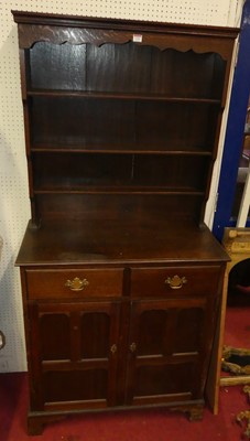 Lot 1156 - An early 20th century narrow oak dresser,...