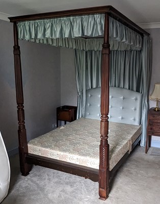Lot 1158 - A mahogany double full tester bed, having...