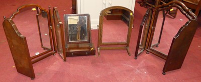 Lot 1187 - Two similar early 20th century walnut triptych...