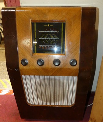 Lot 1194 - A 1950s walnut veneered freestanding Bush...