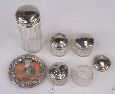 Lot 311 - Five various glass dressing table jars, each...