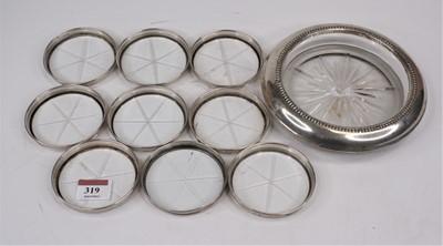 Lot 319 - A continental moulded glass dish with a white...