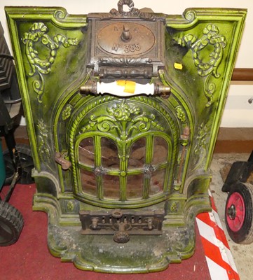 Lot 1209 - An early 20th century French green enamelled...