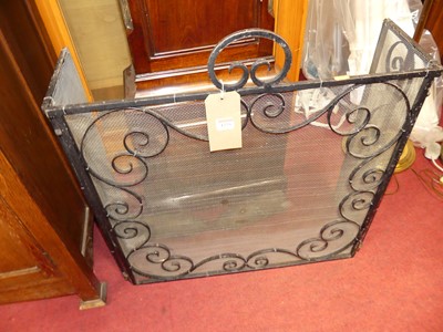 Lot 1225 - An early 20th century wrought iron and mesh...
