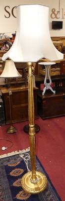 Lot 1233 - A gilt wood fluted standard lamp