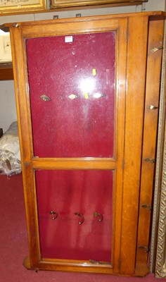 Lot 1239 - A late Victorian oak wall mounted single door...