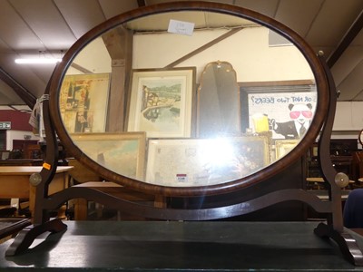Lot 1248 - A circa 1900 mahogany oval swing dressing...