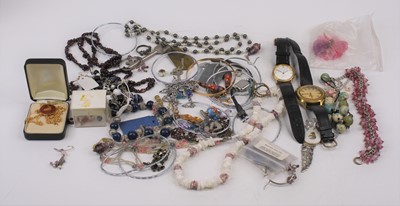 Lot 407 - A collection of costume jewellery to include a...