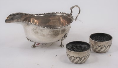 Lot 413 - An early 20th century silver sauceboat;...
